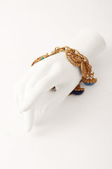 Medieval charm bracelet on mannequin hand @ Recess LA