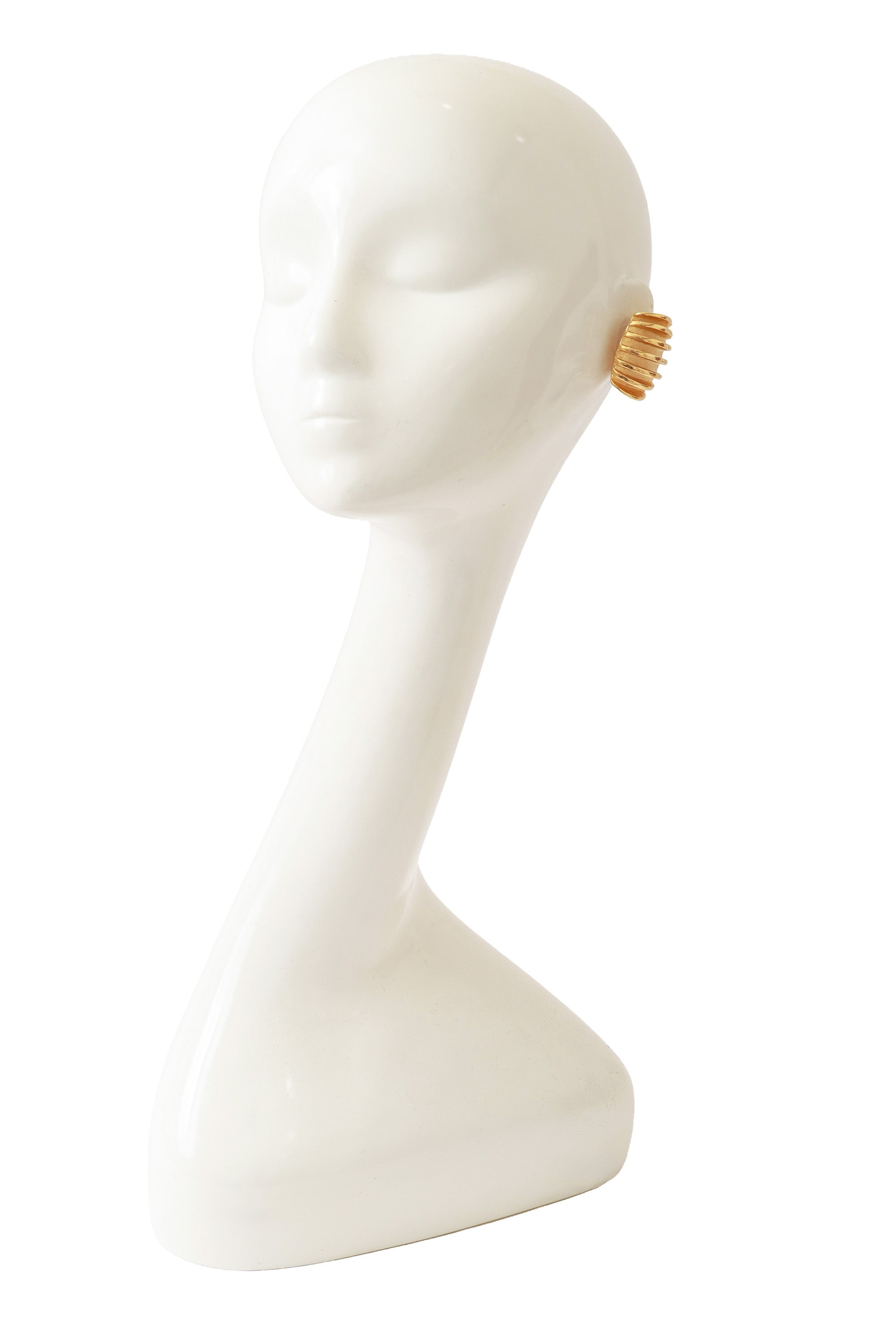 button earrings by Givenchy on mannequin @ Recess LA