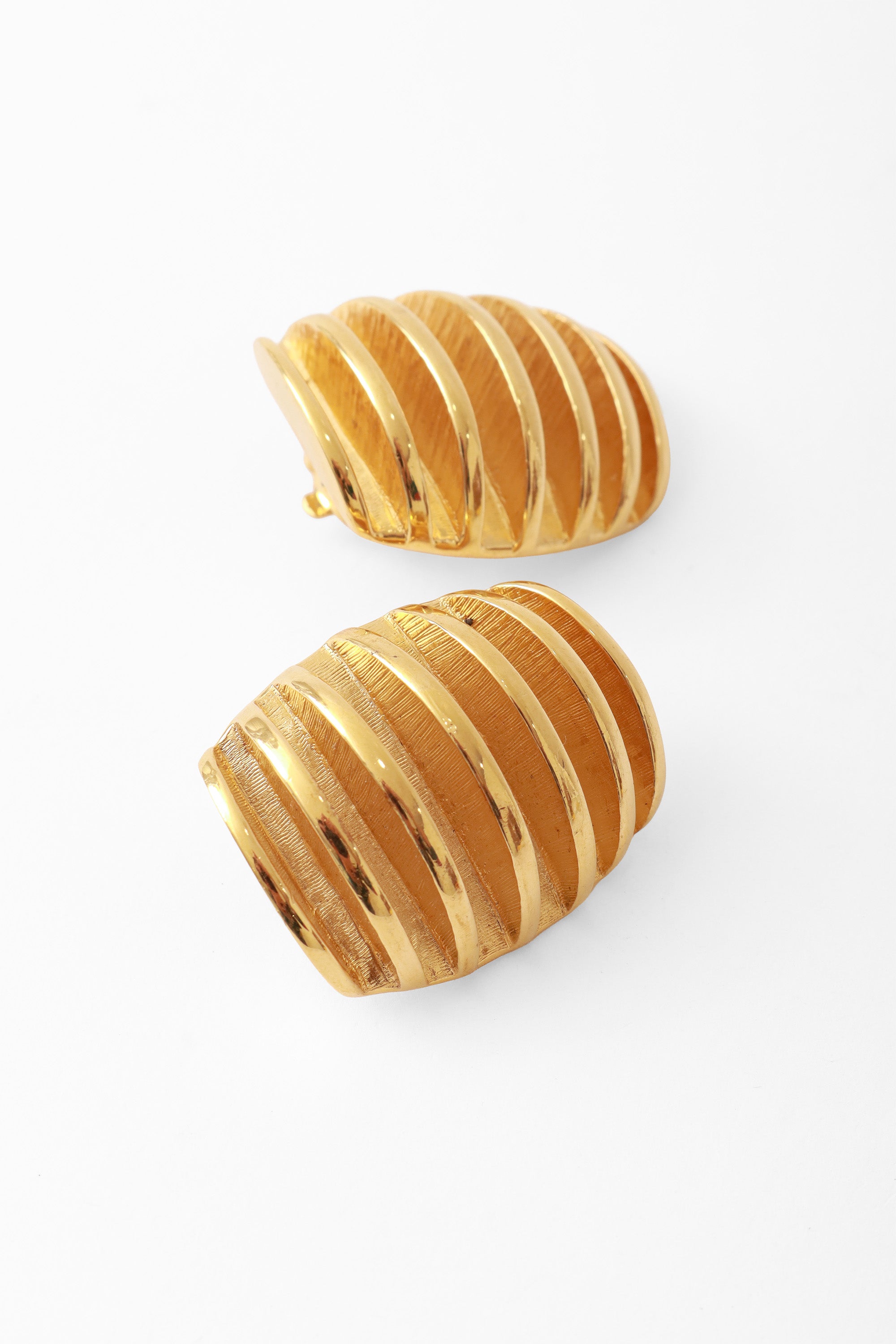 button earrings by Givenchy close @ Recess LA