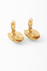 button earrings by Givenchy backs open @ Recess LA