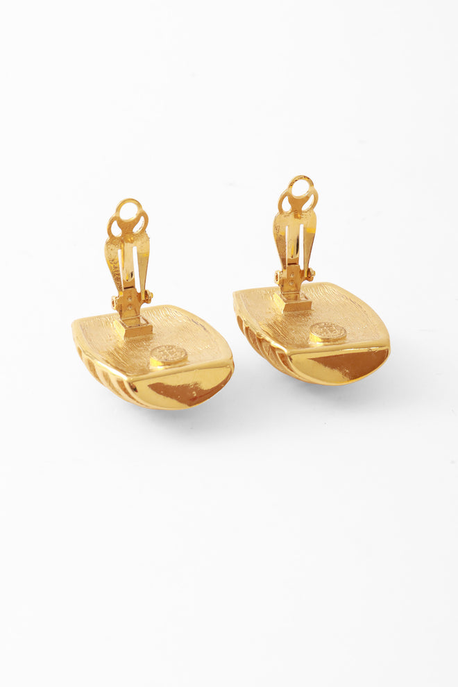 button earrings by Givenchy backs open @ Recess LA