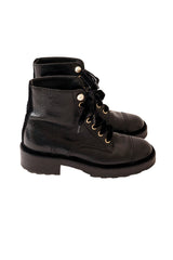 leather ankle boots by Chanel side @ Recess LA