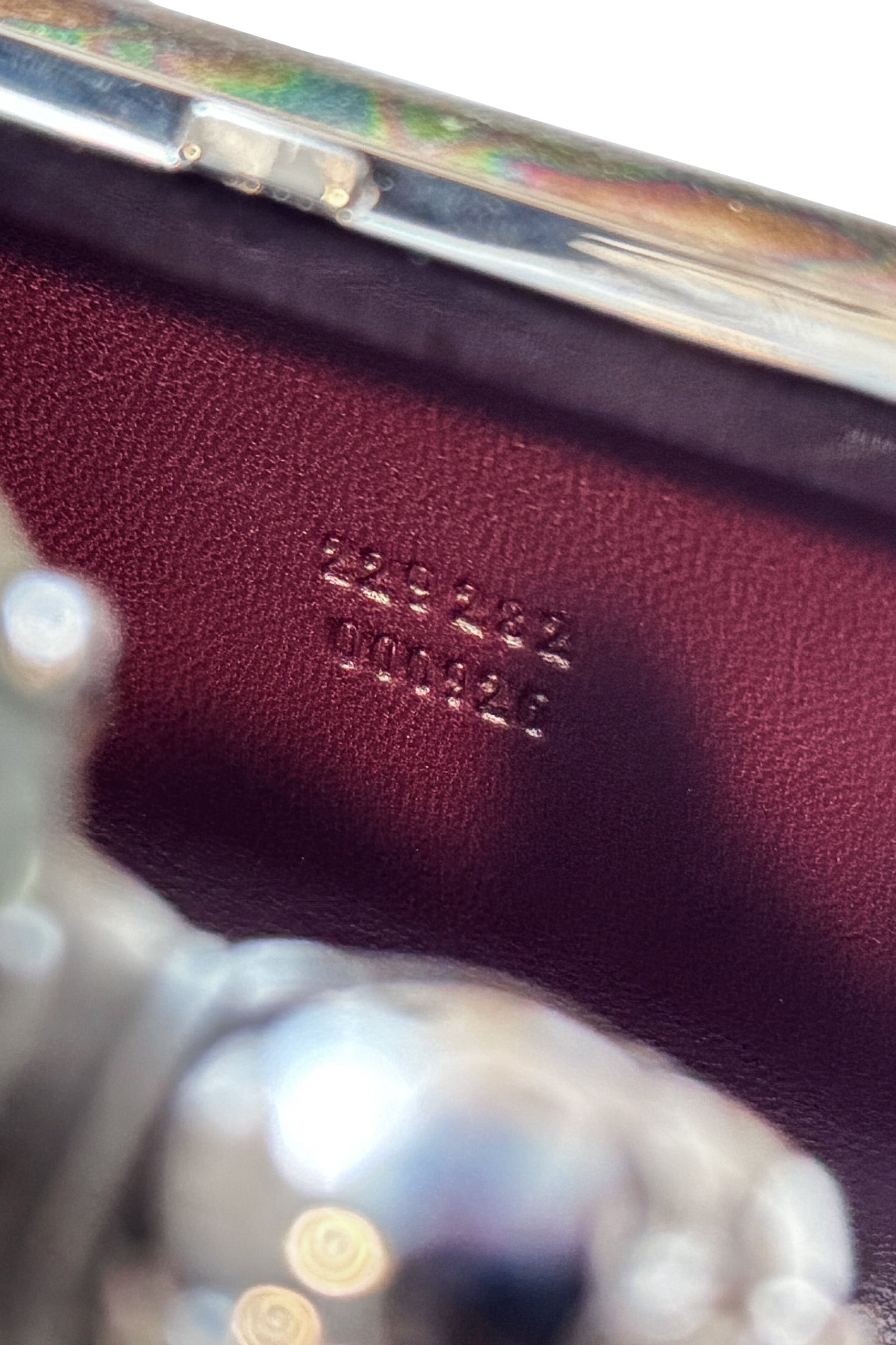 Oil Slick Knuckle Clutch by Alexander McQueen serial @ Recess LA
