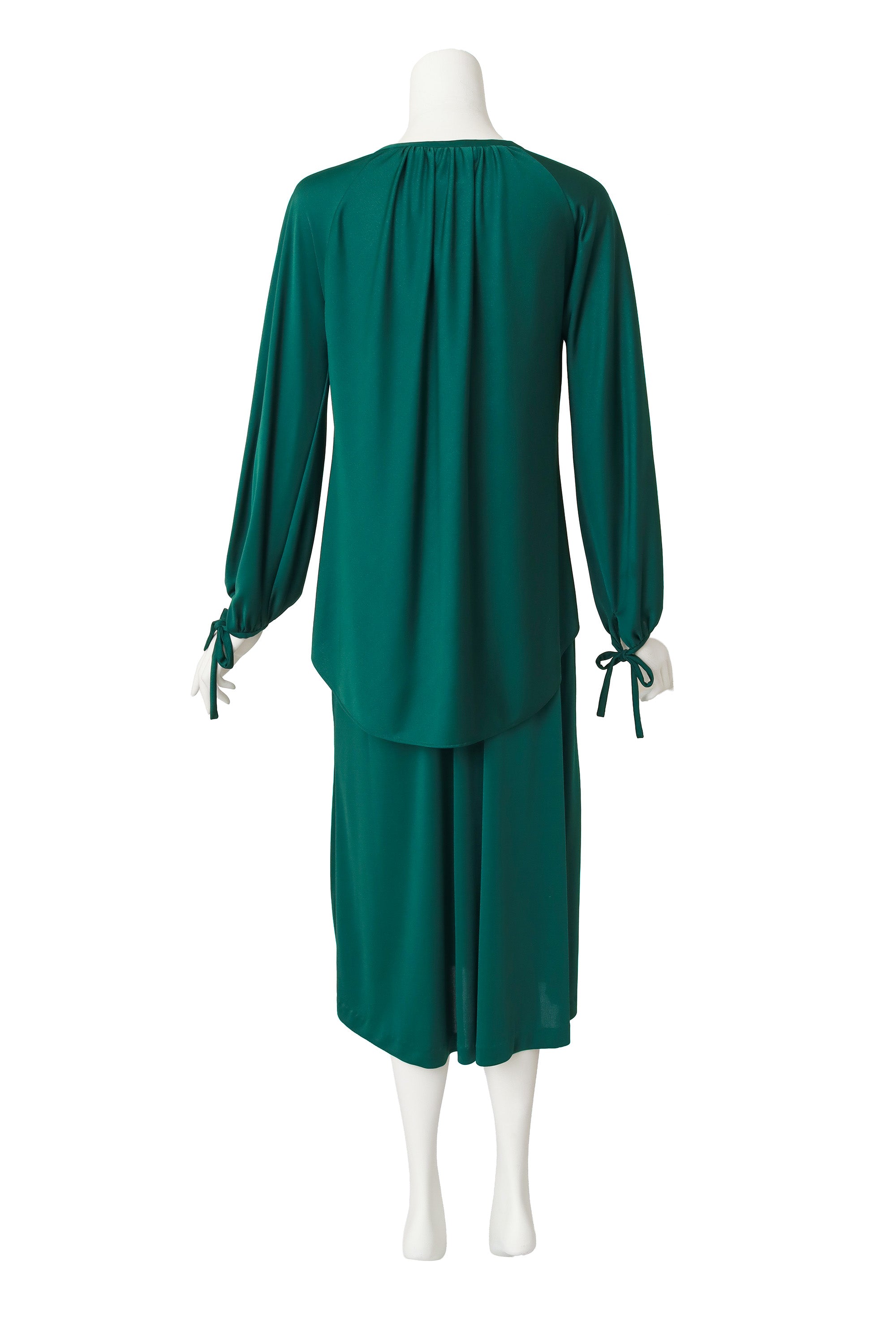 top and skirt set by Halston on mannequin back @ Recess LA