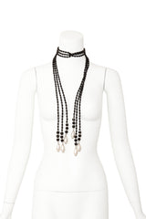 Beaded lariat by Moans wrapped on mannequin @ Recess LA