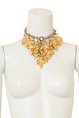 Vintage Alexis Kirk Golden Leaf Charm Necklace on mannequin @ Recess LA