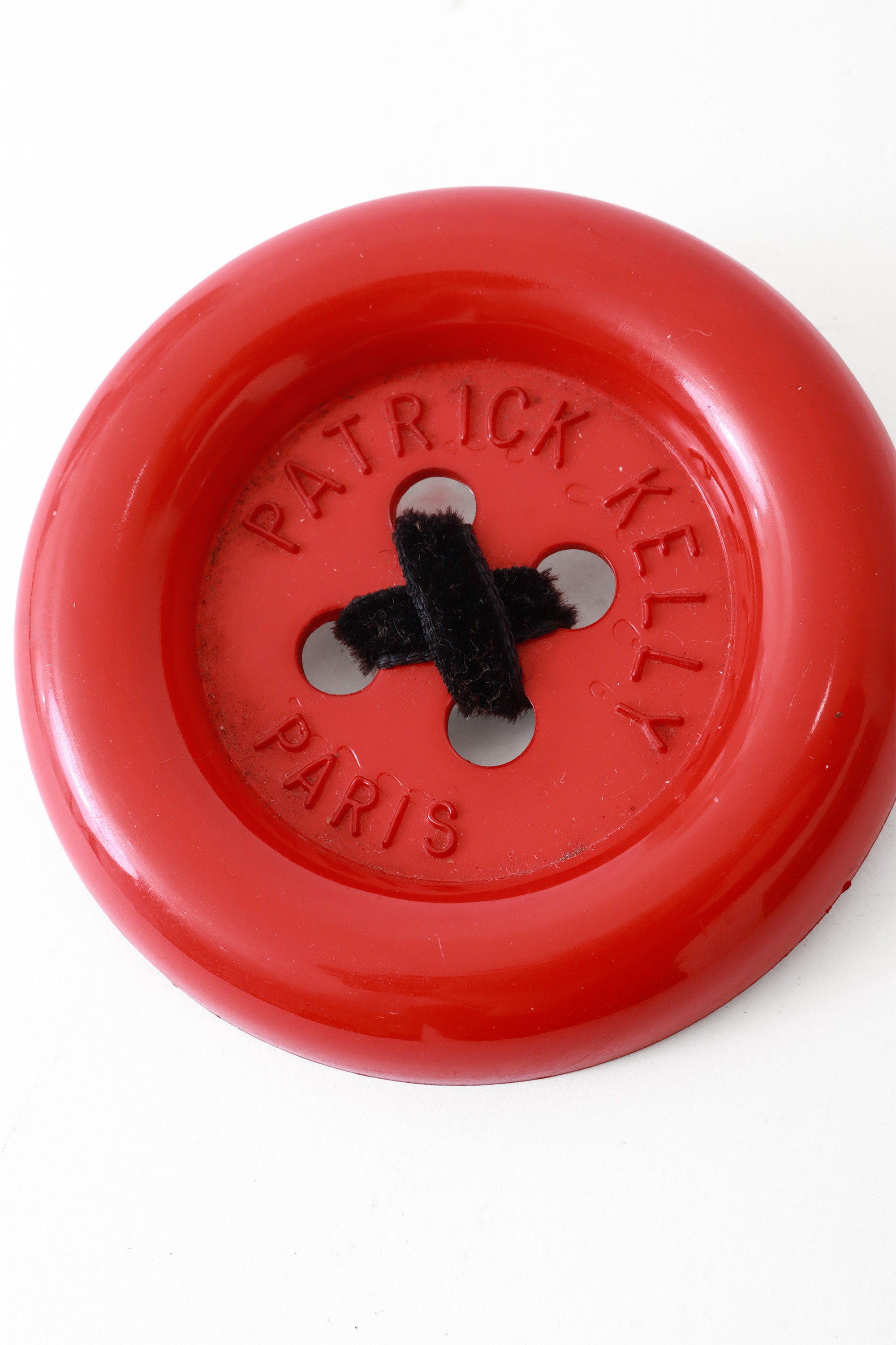 button brooch by Patrick Kelly close up @ Recess LA