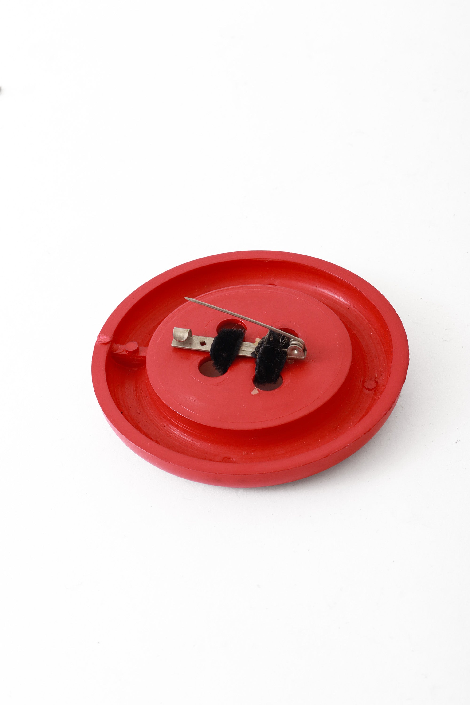 button brooch by Patrick Kelly back pin open @ Recess LA