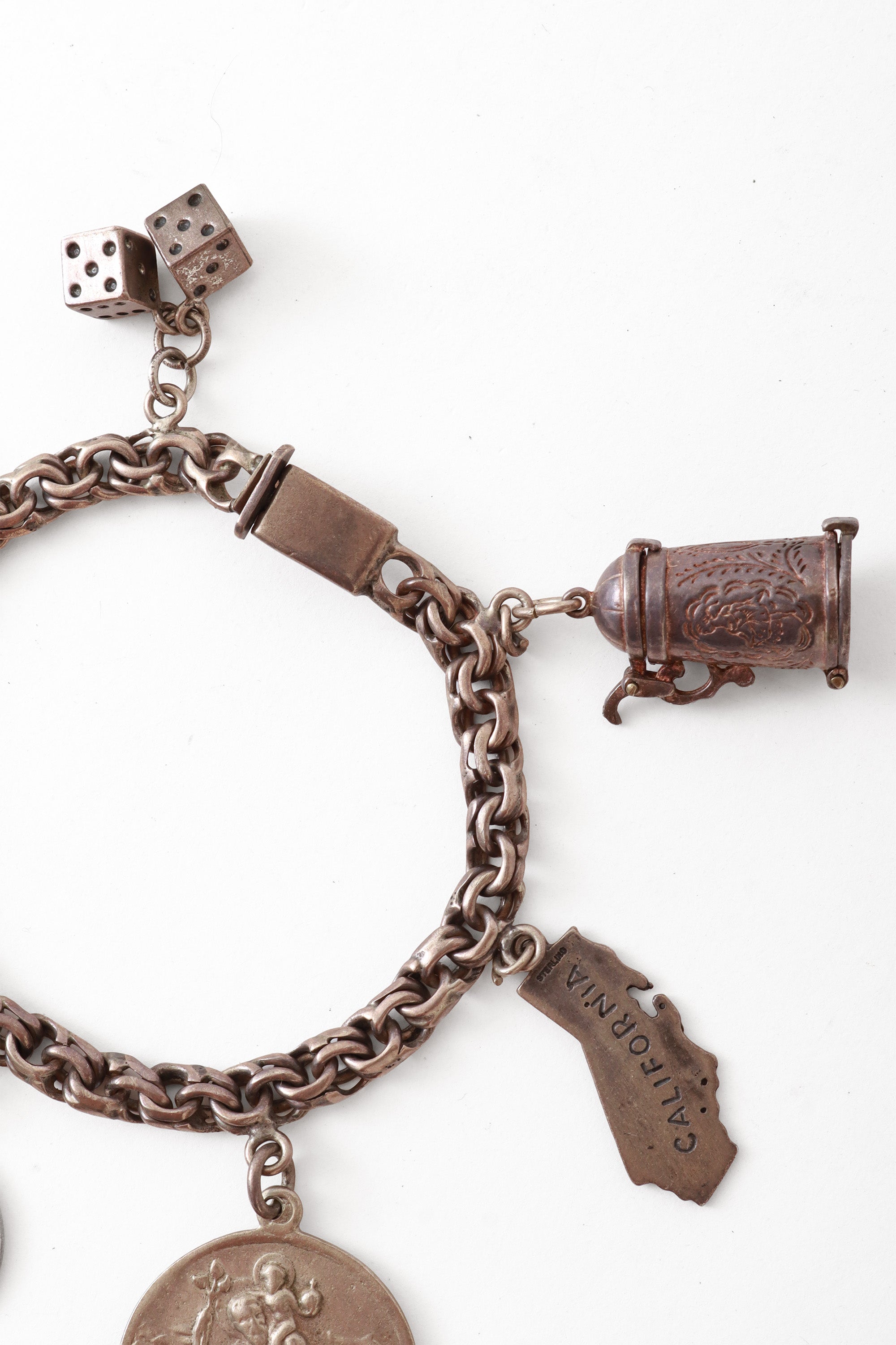 Sterling charm bracelet dice, kettle, california charms @ Recess LA