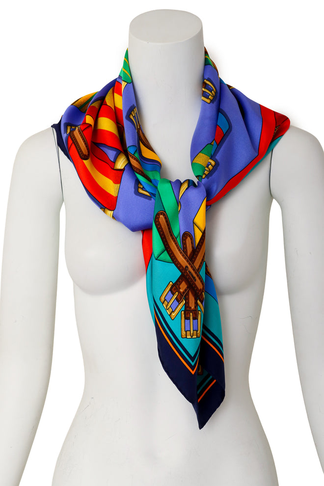 Large silk multi-color belt print scarf by Hermés on mannequin @ Recess LA