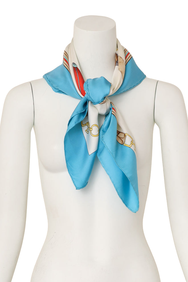 Large silk horse with accessories print scarf by Celine on mannequin @ Recess LA