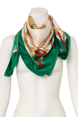 Large silk saddle ribbon patterned scarf by Gucci on mannequin @ Recess LA