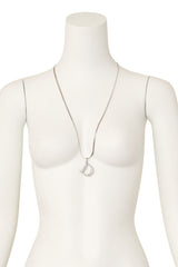 letter pendant necklace by Dior on mannequin @ Recess LA