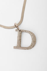 letter pendant necklace by Dior pendant close @ Recess LA