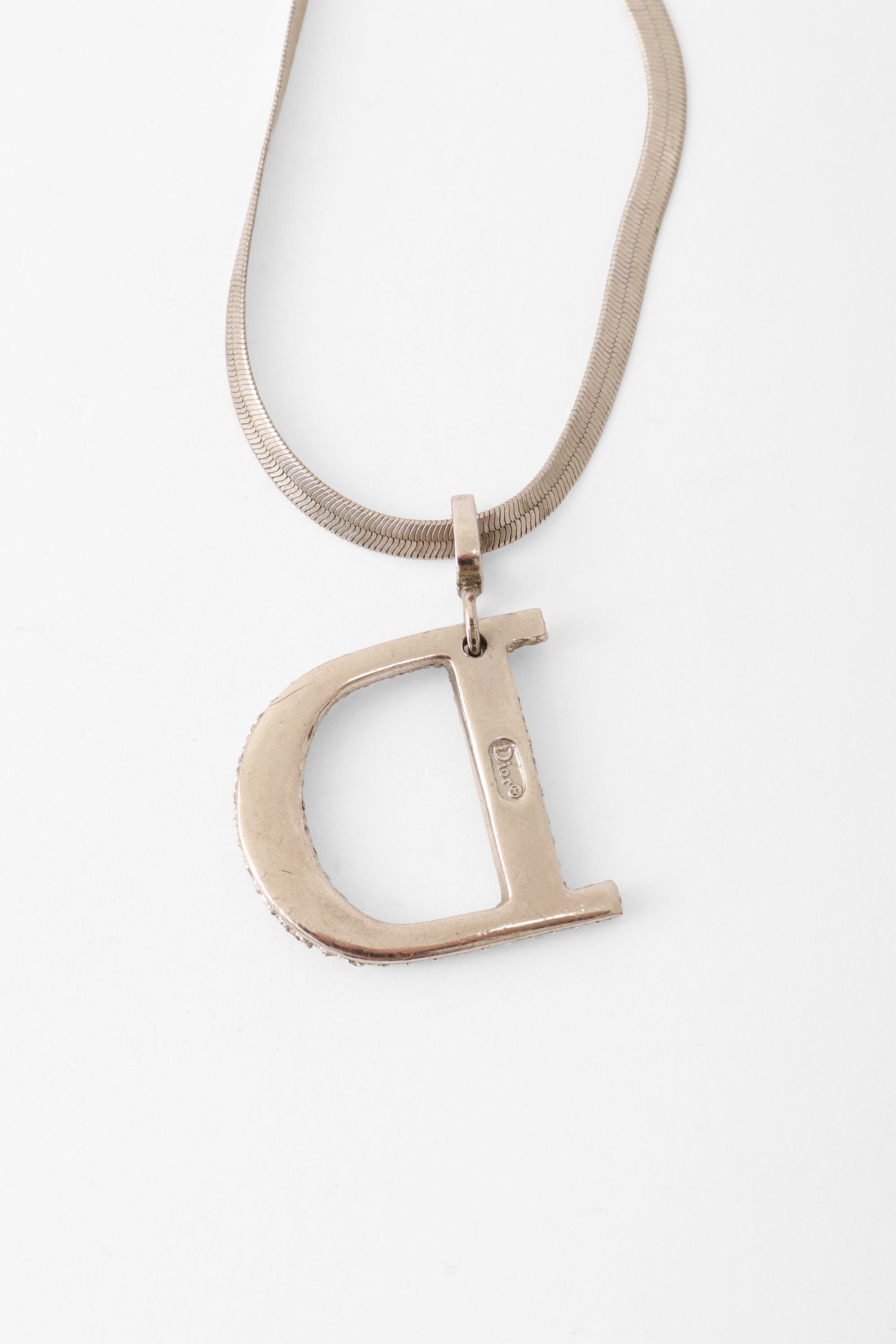 letter pendant necklace by Dior pendant back @ Recess LA