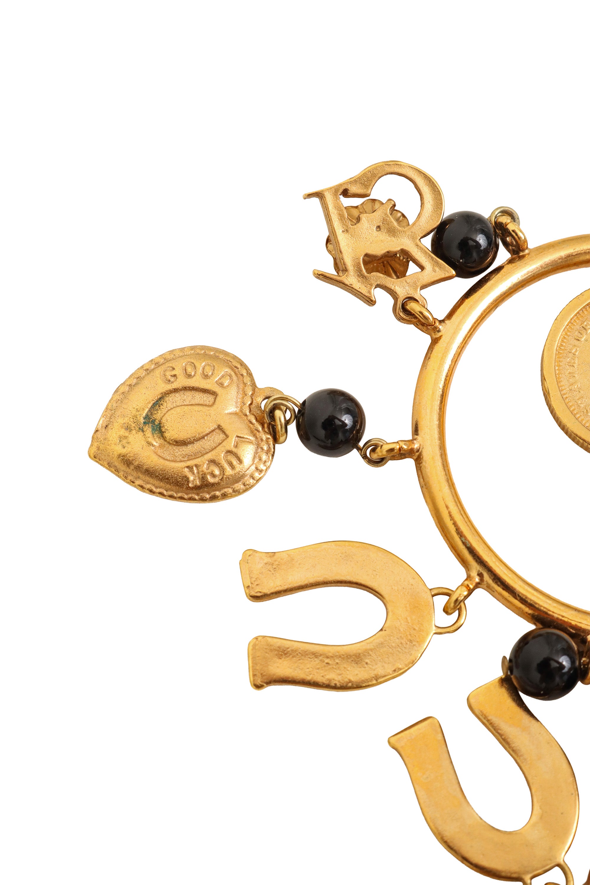 Good Luck Charm Earrings by Dolce & Gabbana tarnish @ Recess LA
