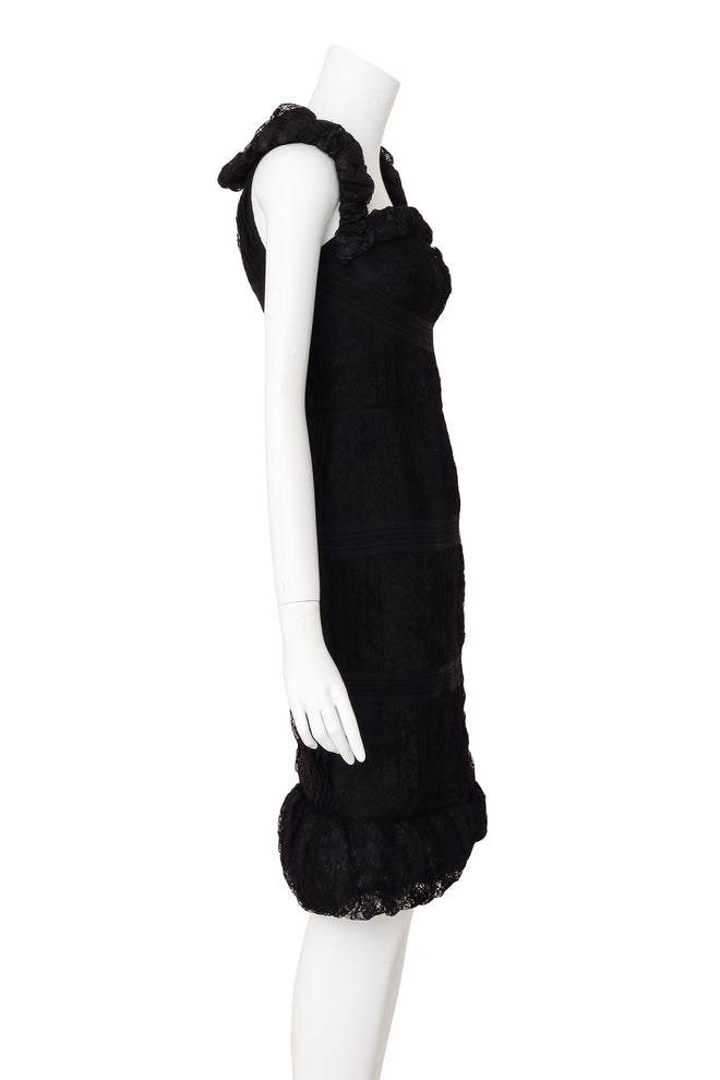 Lace ruffle dress by Chanel on mannequin side @ Recess LA