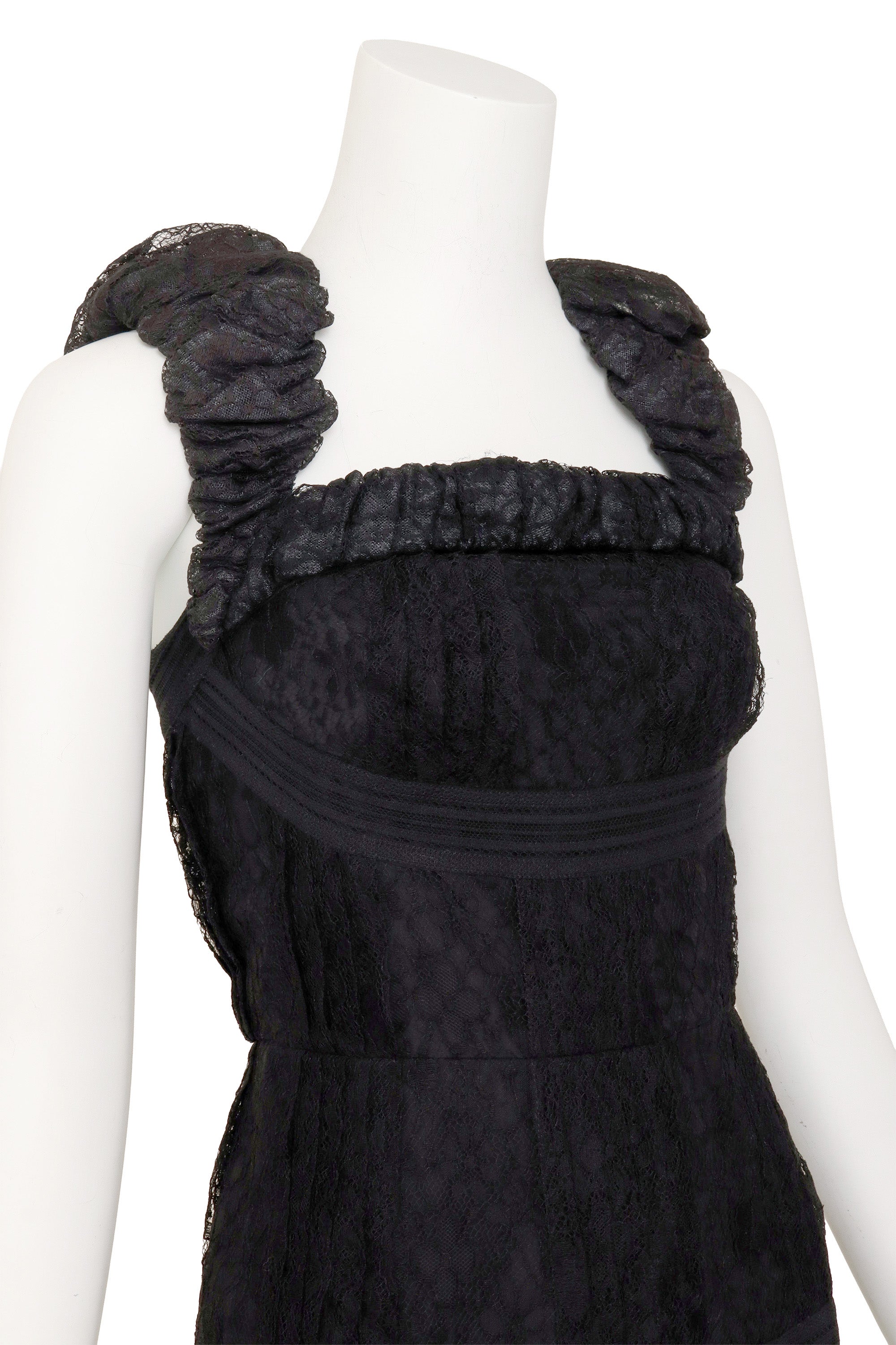 Lace ruffle dress by Chanel on mannequin close @ Recess LA