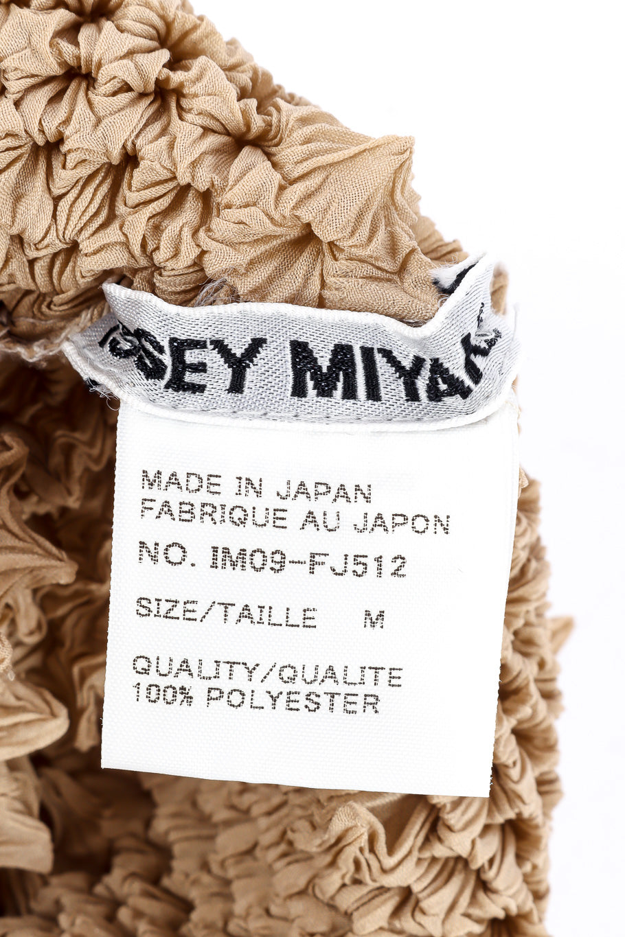 Issey Miyake Spiked Pleat Top label closeup @Recessla