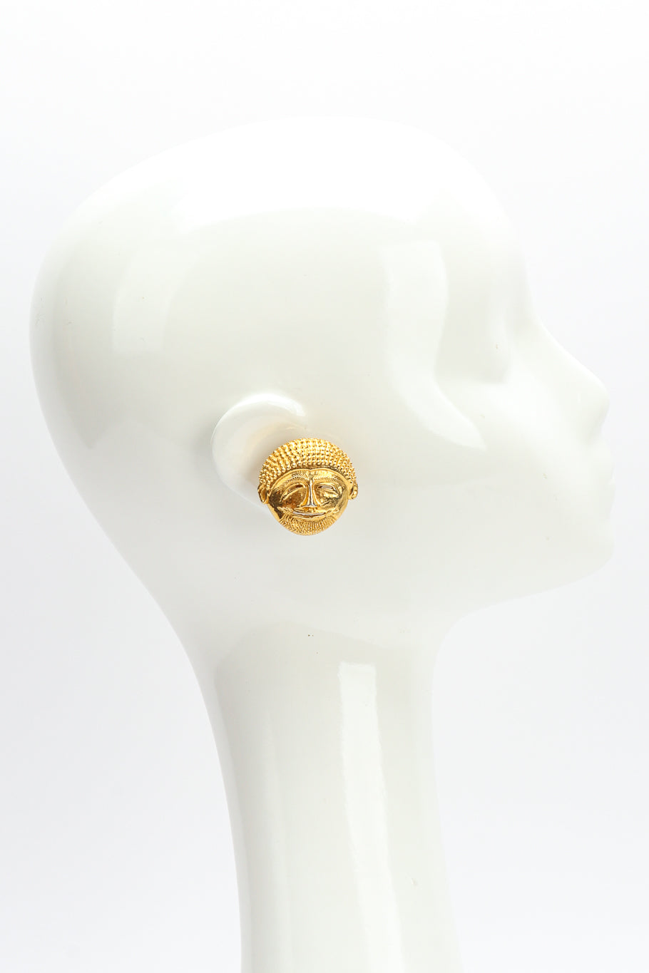 Mask earrings by Isabel Canovas on white background on mannequin head  @recessla