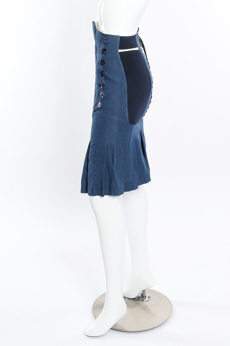 Pleated corset skirt by Jean Paul Gaultier on mannequin side @recessla