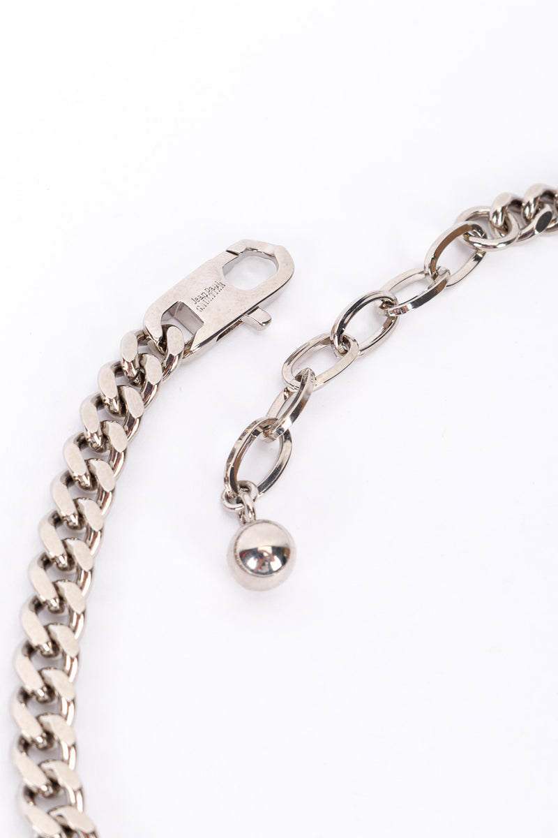 JPG charm necklace by Jean Paul Gaultier on white background unclasped signature close @recessla