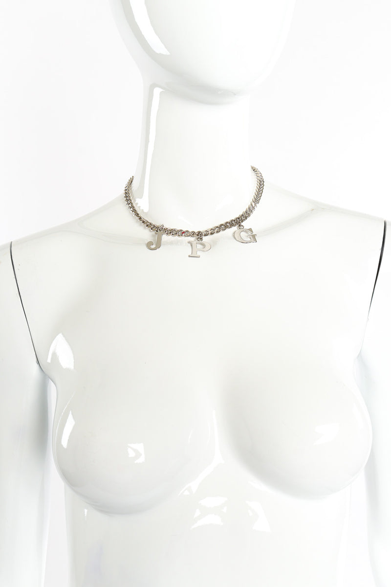JPG charm necklace by Jean Paul Gaultier on white background on mannequin @recessla