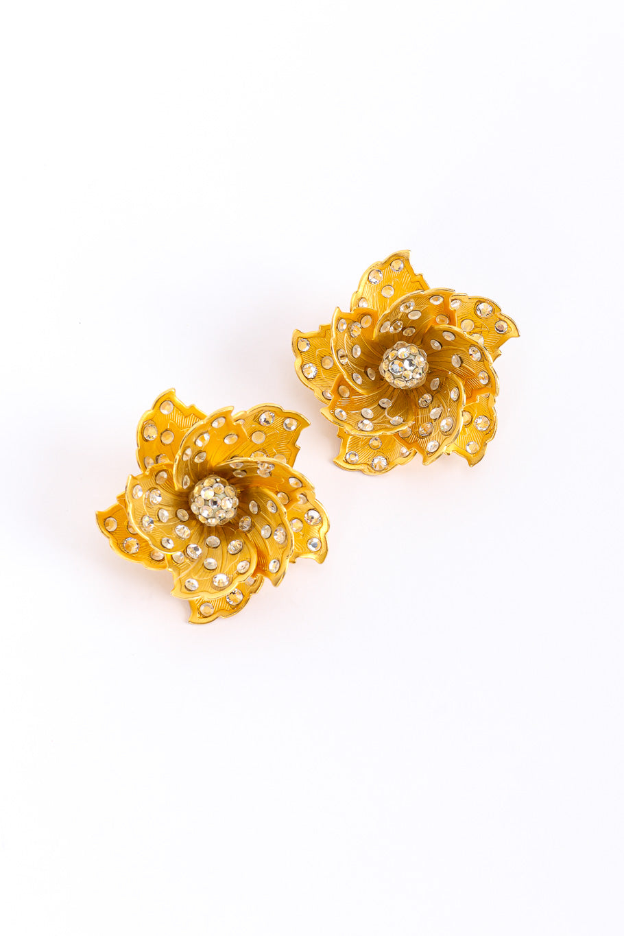 Sculpted flower earrings by James Arpad on white background @recessla