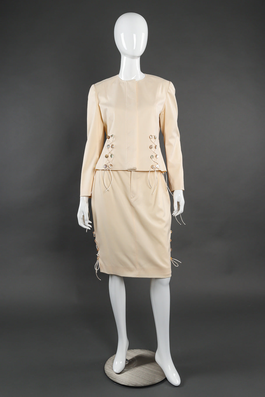 Skirt suit by John Galliano on mannequin front @recessla