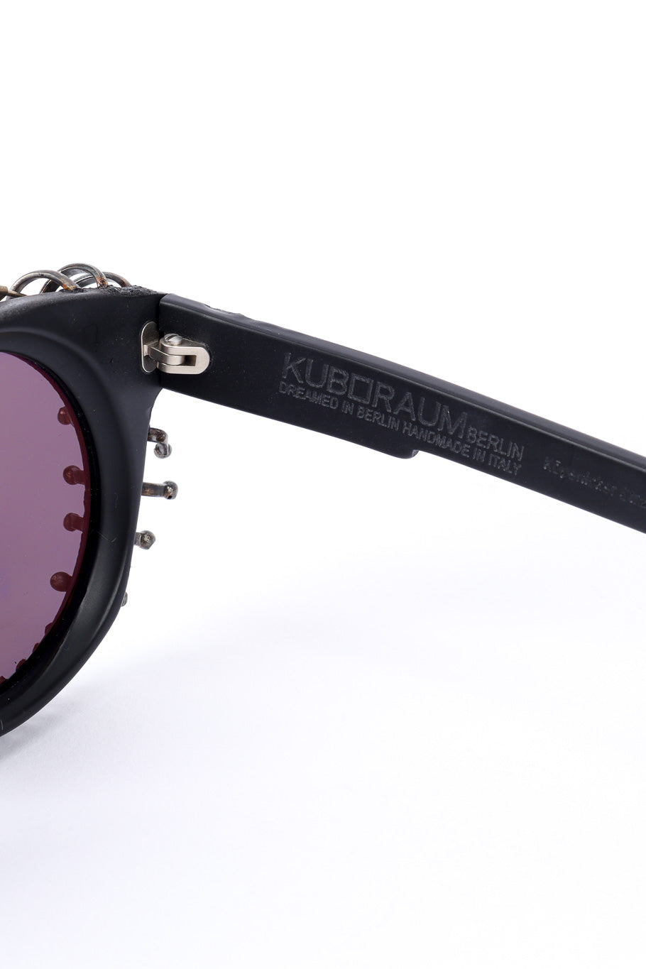 Anarchy sunglasses by Kuboraum on white background inside arm signature close @recessla