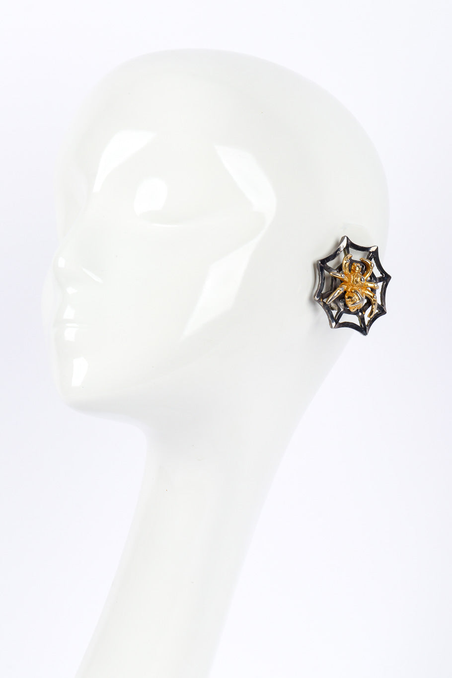 Spider earrings by Lorenz Paris on white background on mannequin @recessla