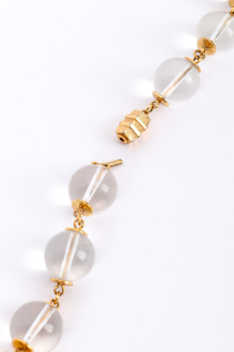 Lucite cylinder link necklace on white background clasp @recessla