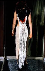 Vintage Margiela Abstract Reptile Dress print on model back with red on 1999 runway