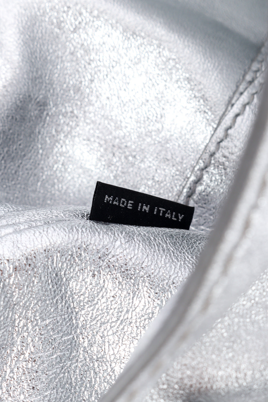 Miu Miu Metallic Drawstring Bag origin label closeup @Recessla