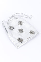 Miu Miu Metallic Drawstring Bag 3/4 view laid flat on white backdrop @Recessla