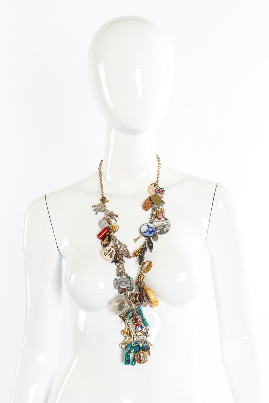 Charm necklace by Monet on white background on mannequin @recessla