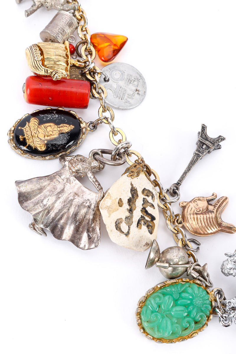 Charm necklace by Monet on white background Eiffel tower and assorted charms @recessla