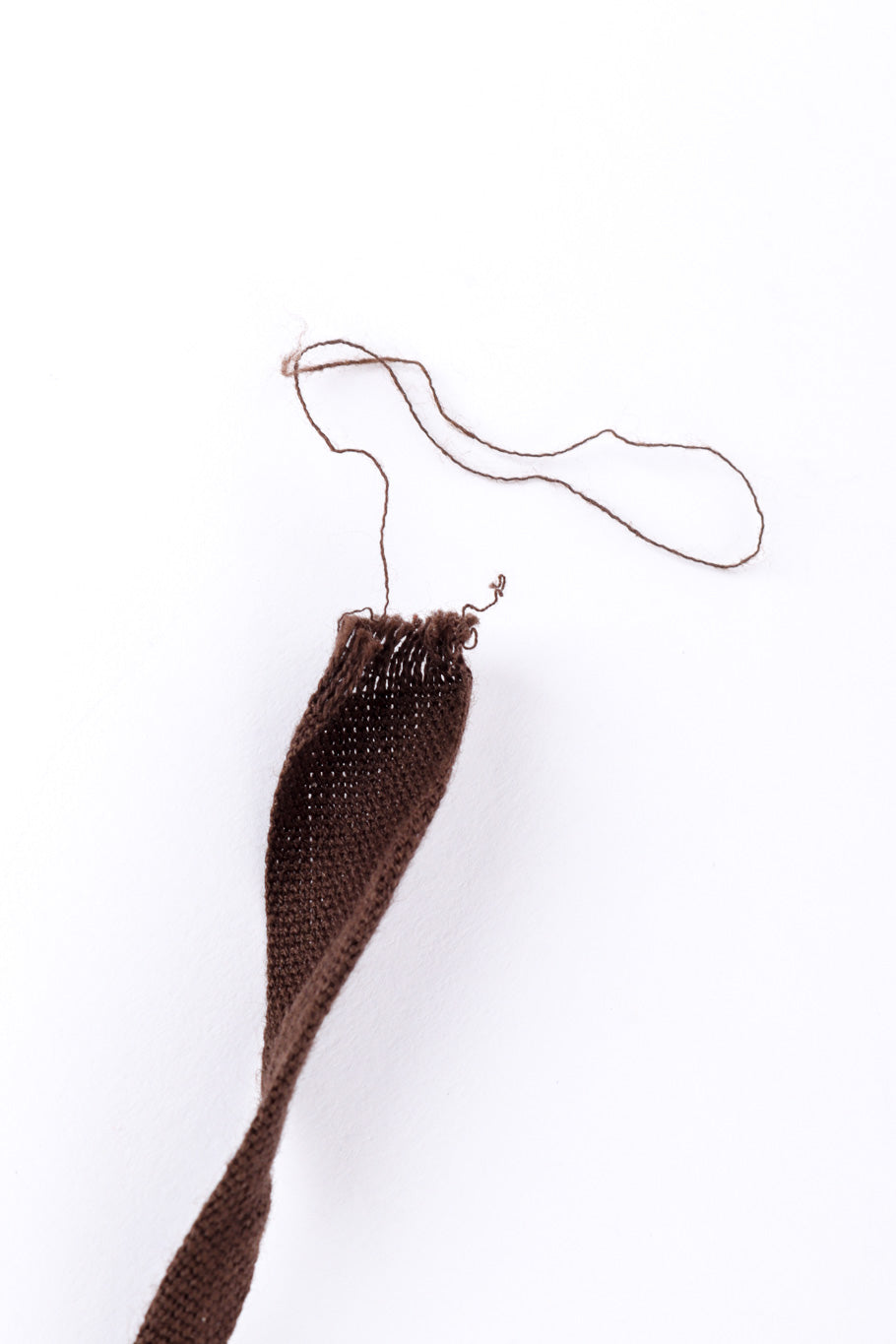 Knit halter top by Maison Margiela unraveling end tab @recessla