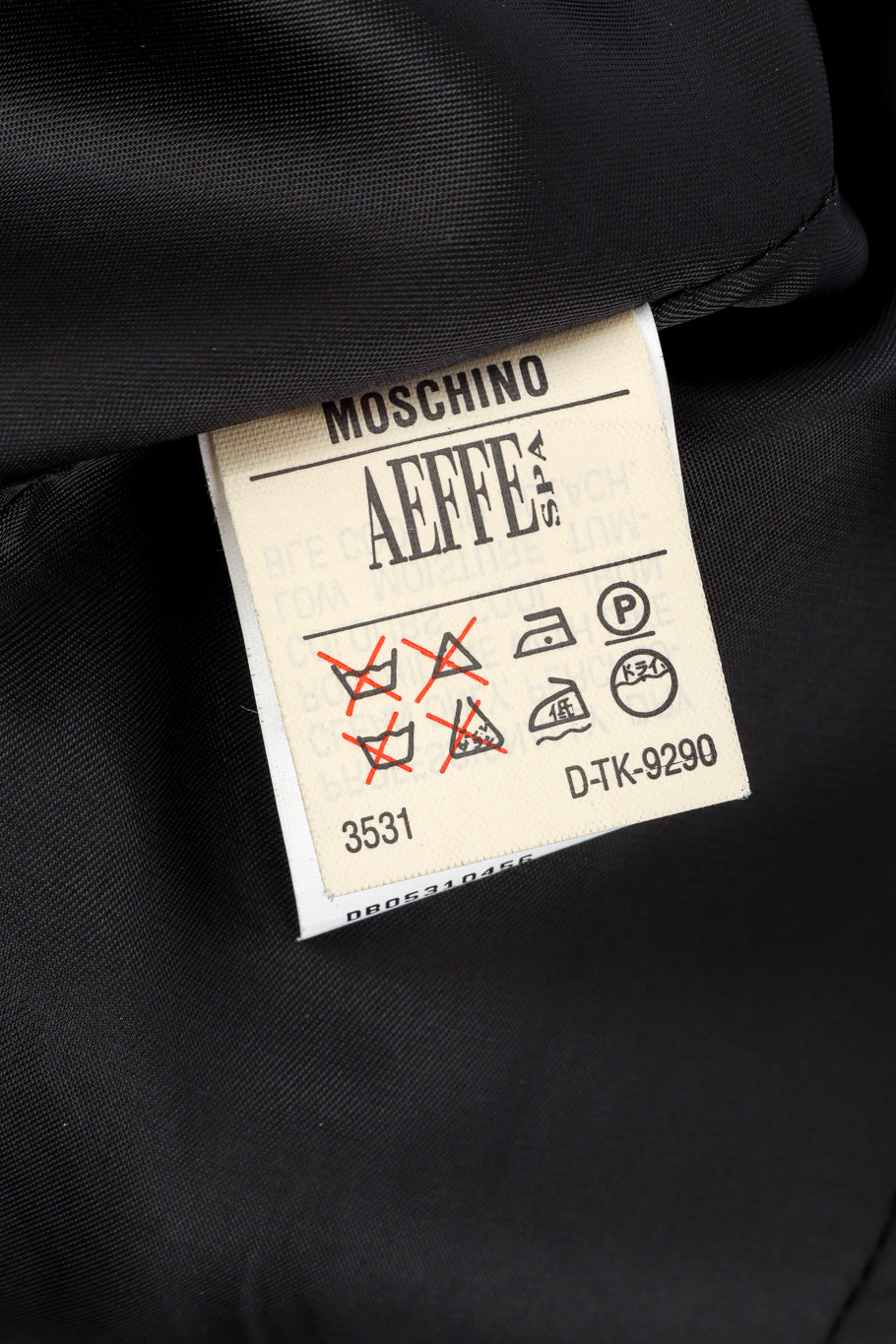 Vintage Moschino Mother of Pearl Button Blazer fabric care label @Recessla