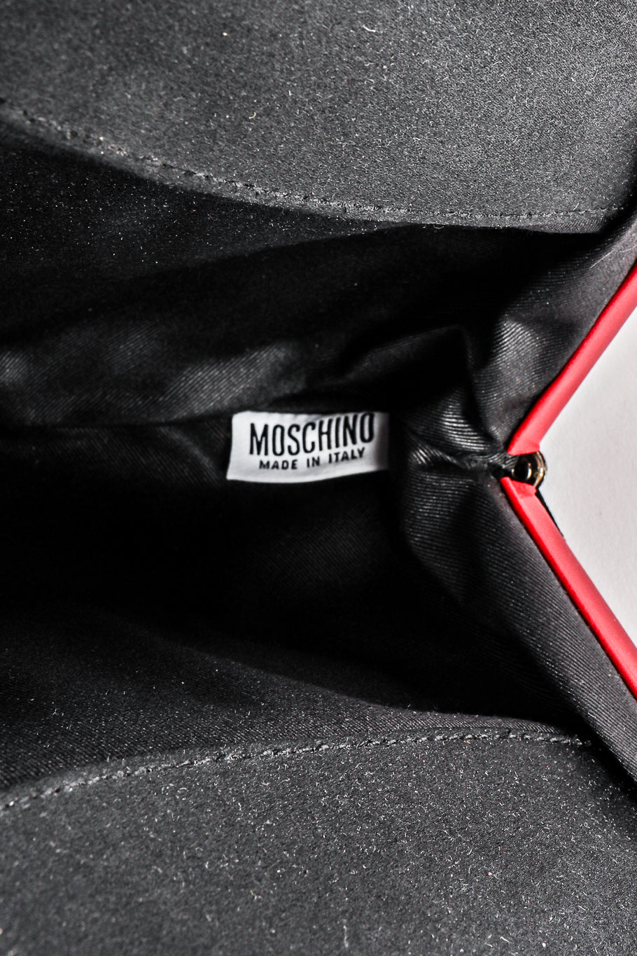 Fringe shoulder bag by Moschino on white background label  @recessla