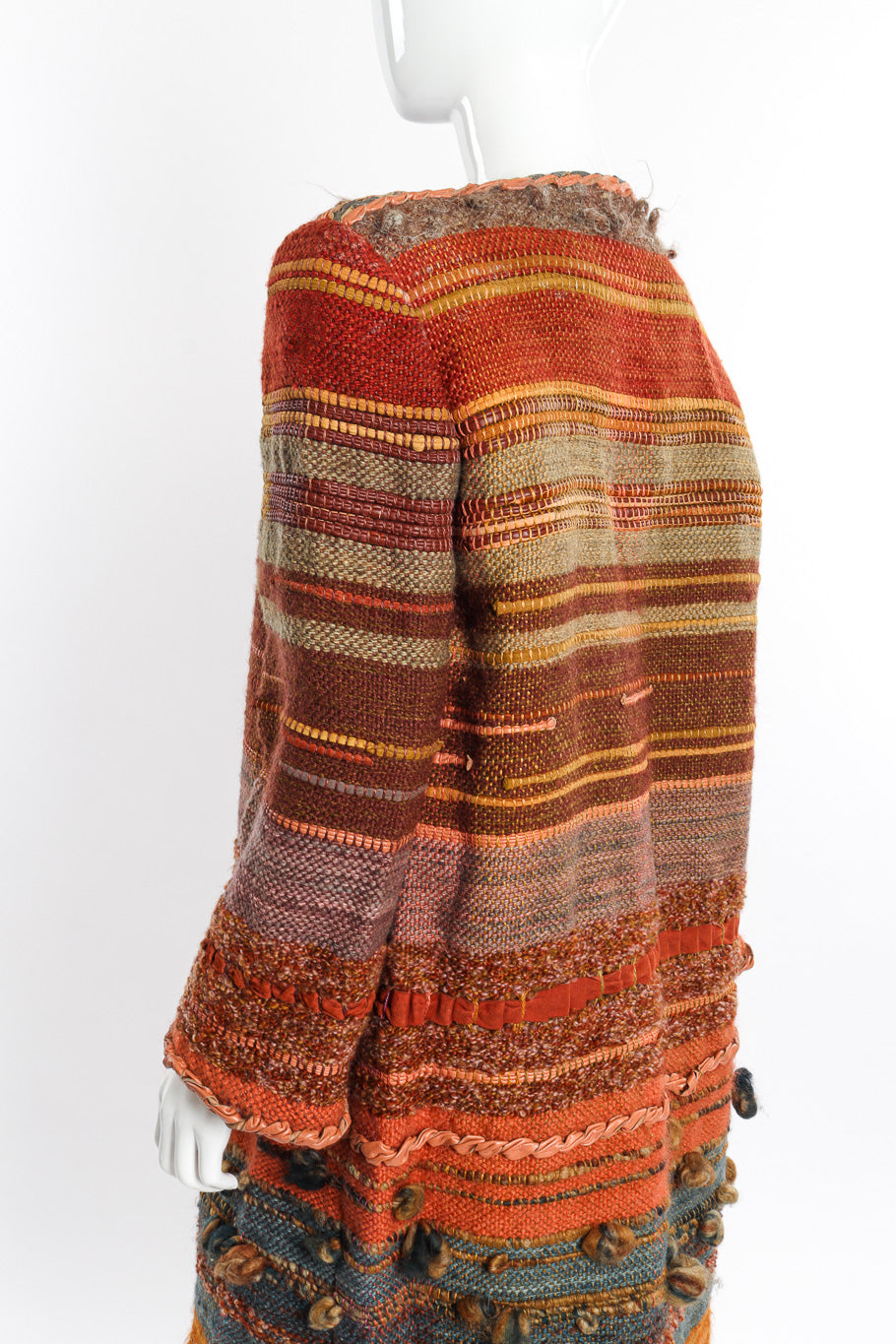 Woven Carpet Coat by Norma Walters on mannequin shoulder @recessla