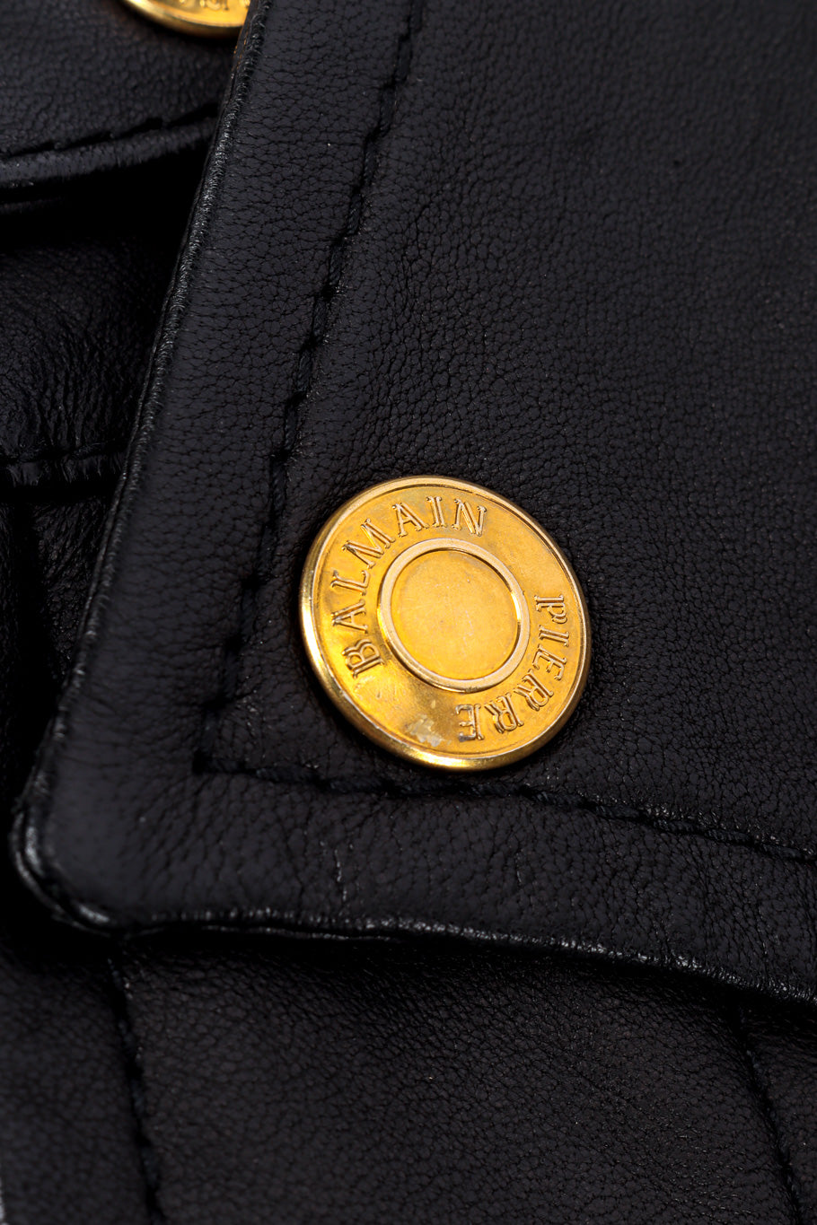 Pierre Balmain Ribbed Leather Moto Jacket logo button closeup @Recessla