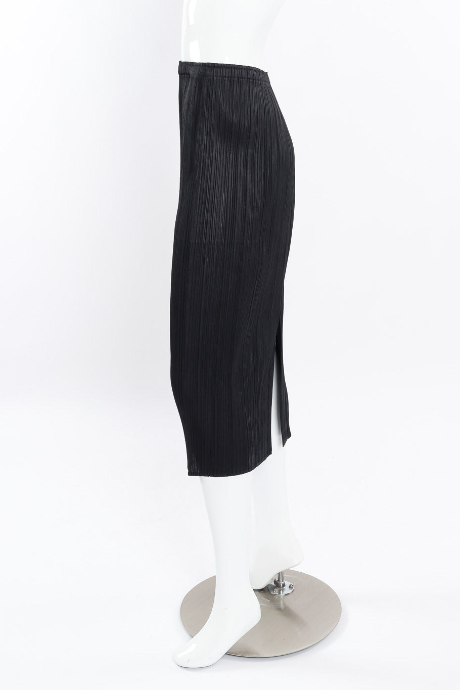 Pleated skirt, top, and jacket set by Issey Miyake on mannequin side skirt only @recessla