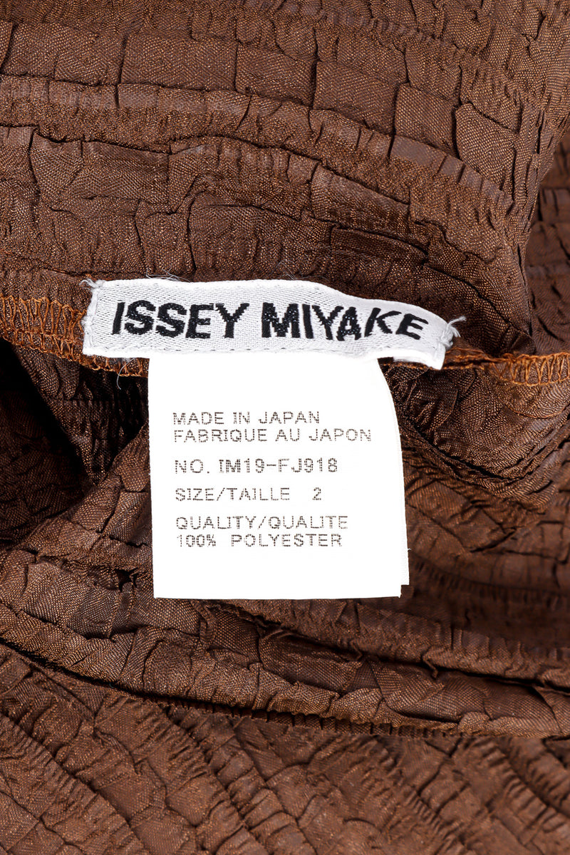 Textured three piece set by Issey Miyake flat lay label @recessla 