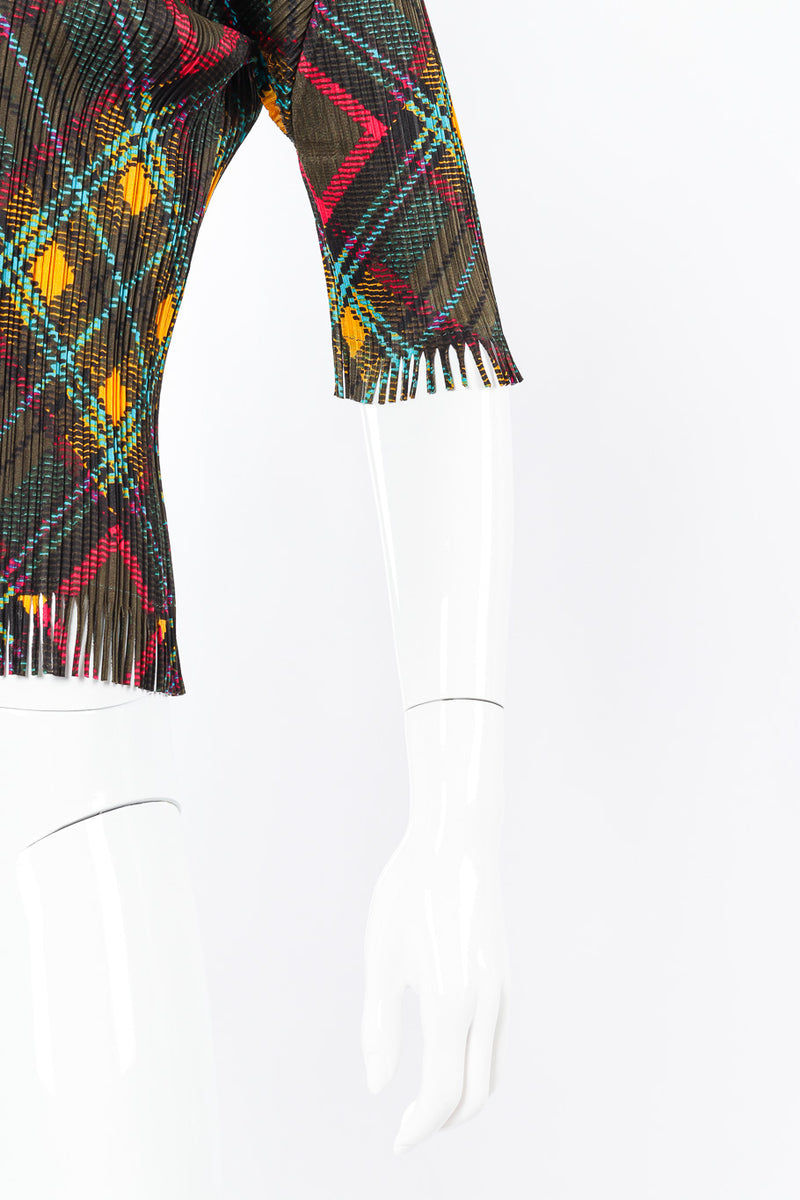 Pleated fringe top by Issey Miyake on mannequin sleeve close @recessla