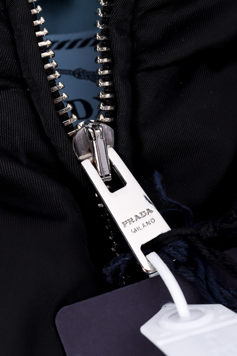 Prada Re-nylon Cropped Puffer Vest front zipper closeup @Recessla