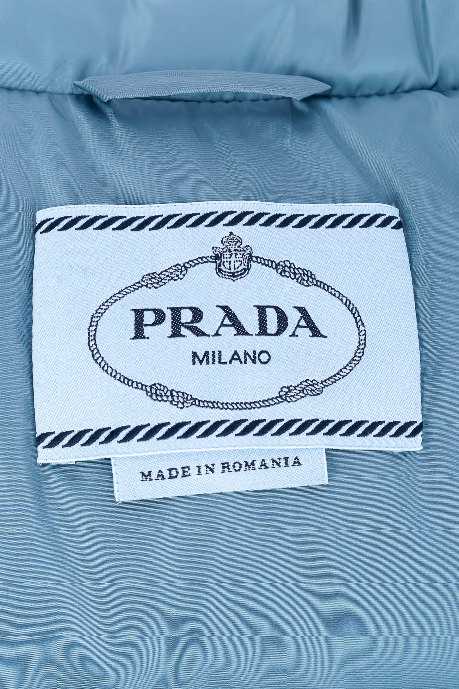 Prada Re-nylon Cropped Puffer Vest signature label closeup @Recessla