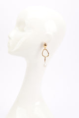 Vintage Oscar de la Renta Mismatched Organic Geo Drop Earrings on mannequin @recess la