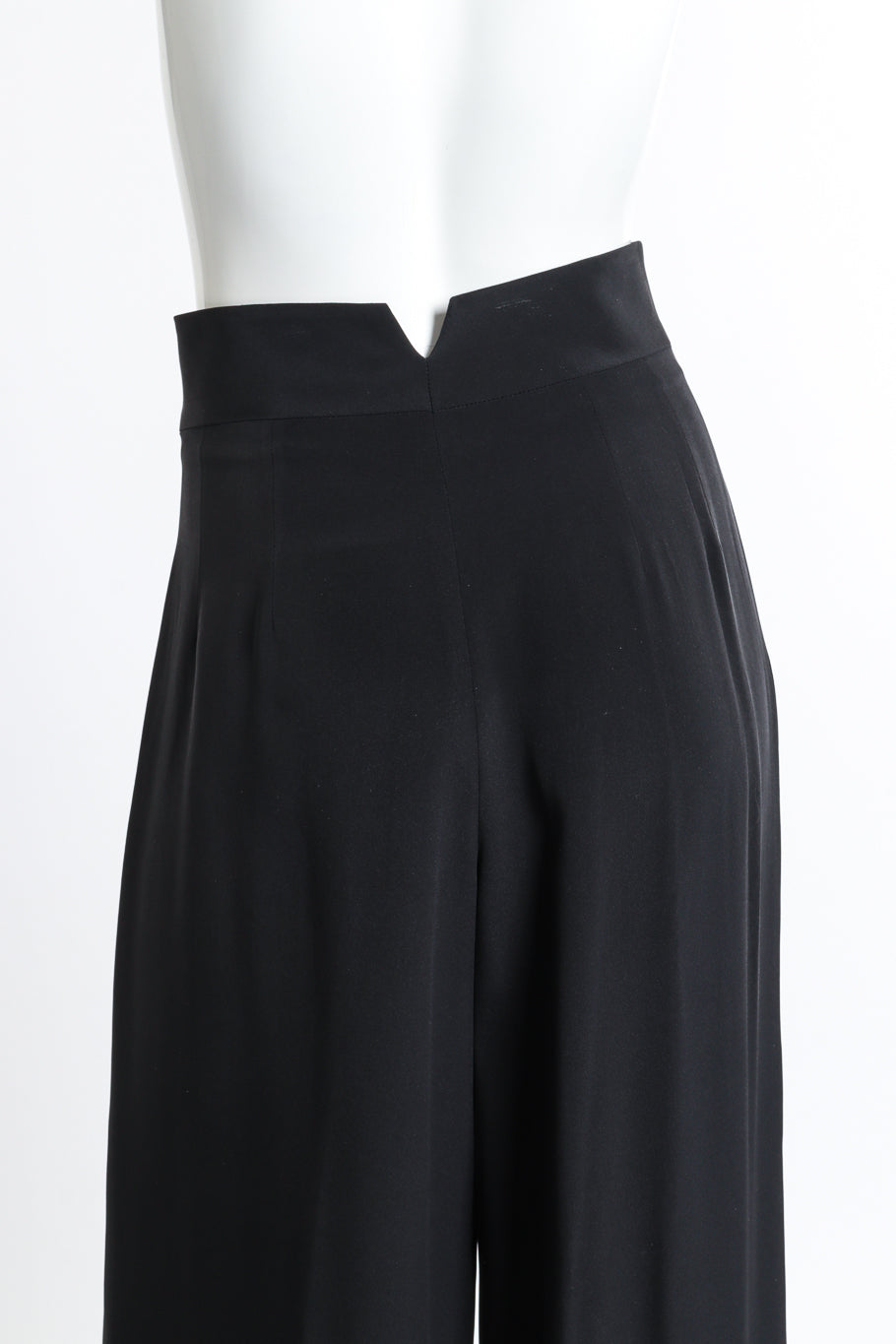 Vintage Richard Tyler wide leg high waisted black pants close up detail of the V cut in the waistband rear view as worn on mannequin @RECESS LA