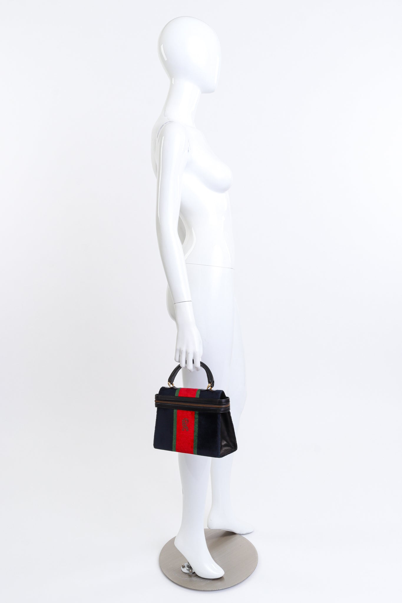 Vintage Roberta di Camerino Velvet Stripe Zip-Around Handbag held by mannequin @recess la